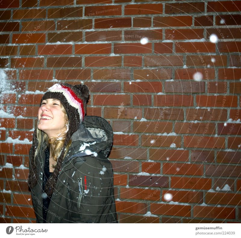 winter joy Young woman Youth (Young adults) Head 1 Human being 18 - 30 years Adults Winter Weather Ice Frost Snow Snowfall Building Facade Coat Cap Laughter
