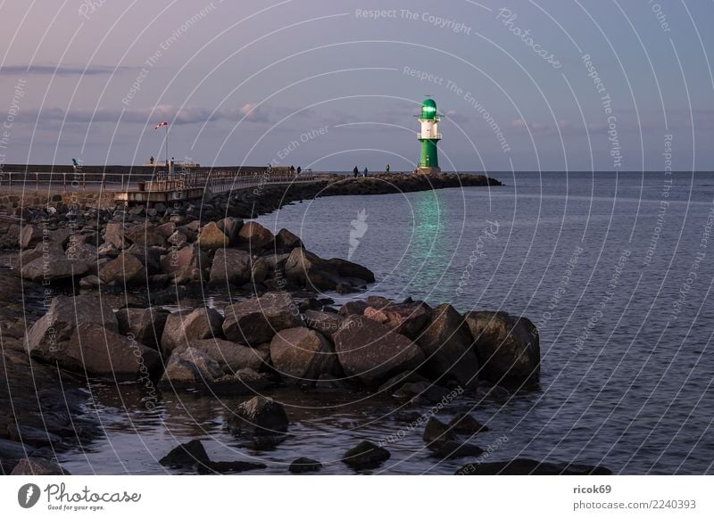 Mole at the Baltic Sea coast in Warnemünde Relaxation Vacation & Travel Tourism Ocean Nature Landscape Water Clouds Rock Coast Lighthouse Architecture
