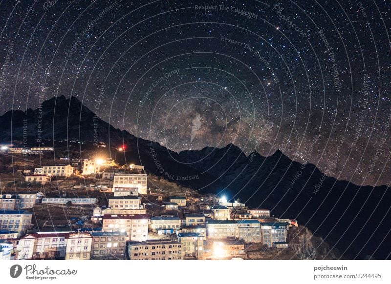 Milky way over mountain range at Namche Barzaar,Nepal Landscape Earth Night sky Stars Mountain Thamserku Asia Village Blue Multicoloured Astrophotography Idyll