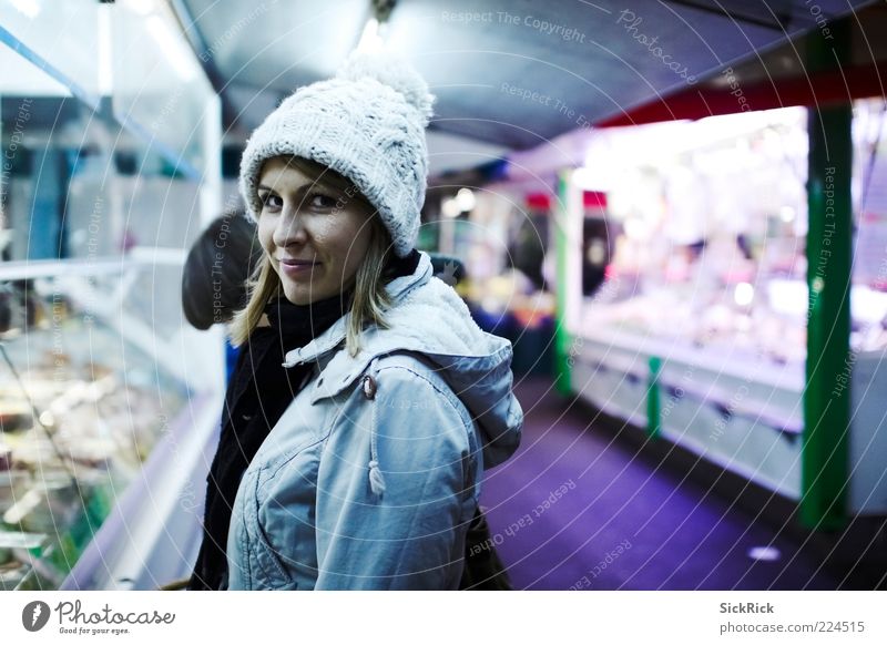 buying cheese Feminine Young woman Youth (Young adults) Woman Adults 1 Human being 18 - 30 years Marketplace Cap Shopping Looking Cold Blue Violet Colour photo