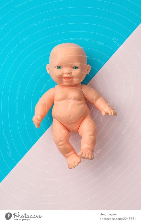 Baby doll on pink and blue Design Skin Playing Child Infancy Toys Doll Plastic Old Sit Naked Cute Blue Pink isolated background dolly dolls head