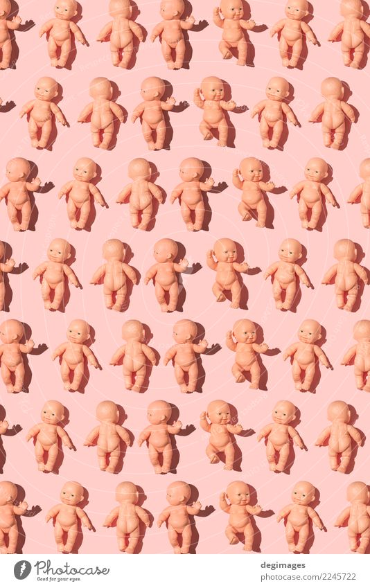 Baby doll pattern on pink Design Skin Playing Child Infancy Toys Doll Plastic Old Sit Naked Cute Blue Pink background dolly dolls head Object photography girl