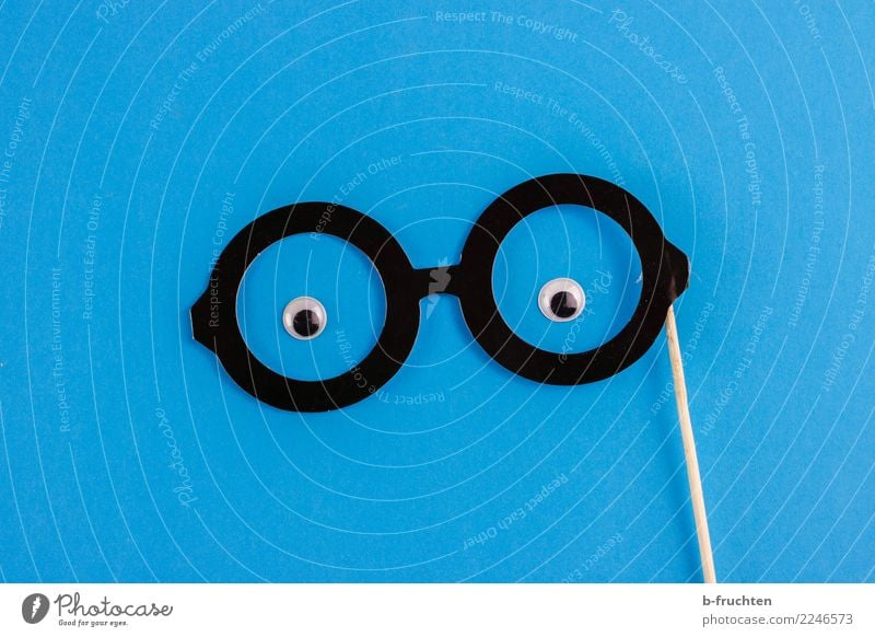 snoop Carnival Eyes Eyeglasses Paper Observe Looking Friendliness Curiosity Blue Black Watchfulness Requisite Vista Smart Man Masculine Colour photo Studio shot