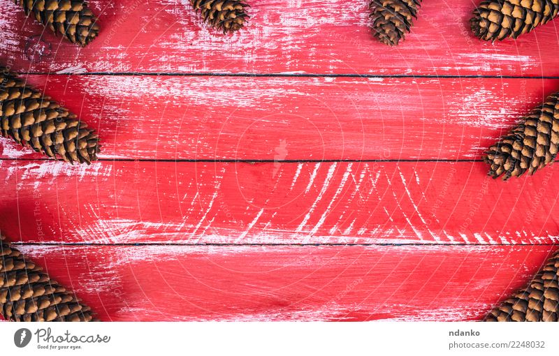 red wooden background with cones Design Decoration Table Christmas & Advent New Year's Eve Nature Wood Natural Brown Red Tradition Consistency board christmas