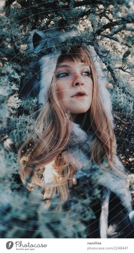 Young wild woman wearing a fur hat into the woods Exotic Hair and hairstyles Skin Face Senses Human being Feminine Young woman Youth (Young adults) 1