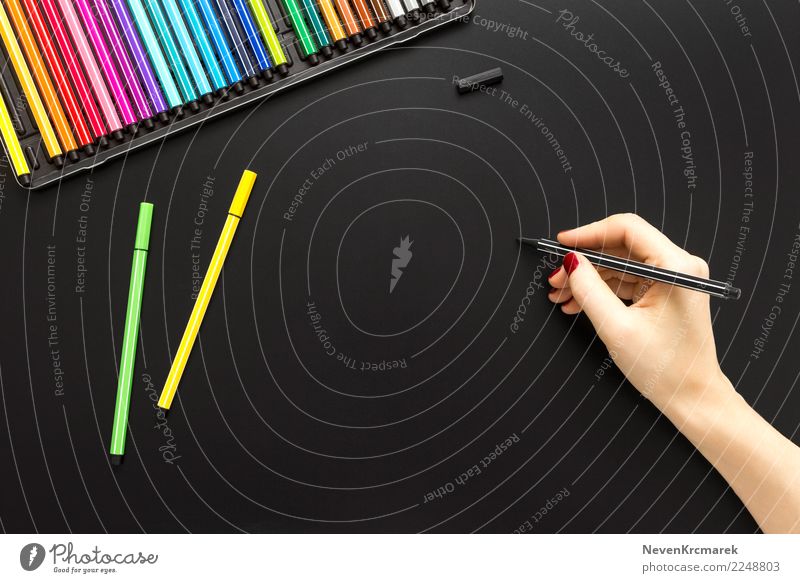 Tabletop scene with female hand writing Desk Hand Art Artist Work of art Write Hip & trendy Above Clean Blue Multicoloured Yellow Green Black Style Mock-up Pen