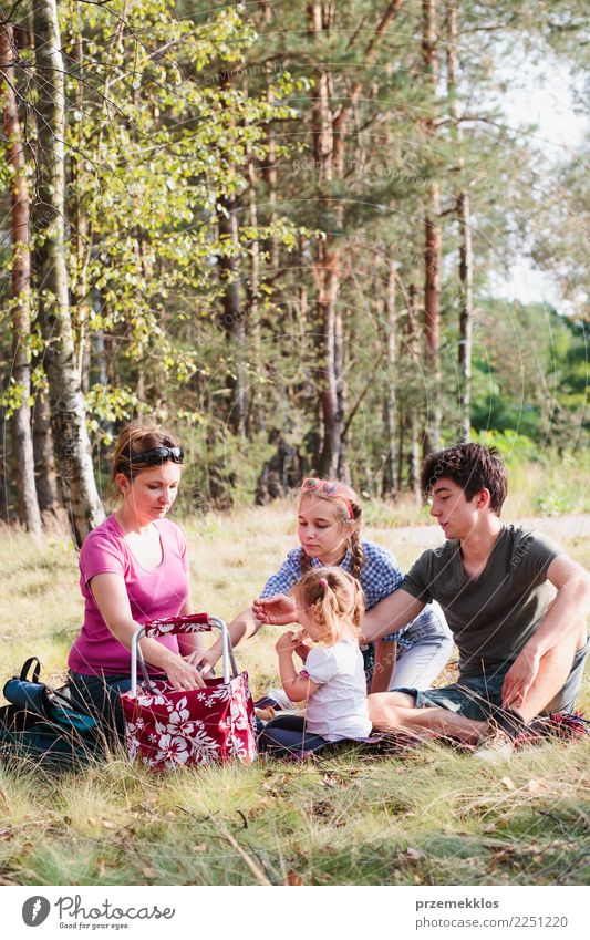 Family spending vacation time together on a picnic Lifestyle Joy Happy Relaxation Vacation & Travel Summer Child Human being Girl Boy (child) Mother Adults