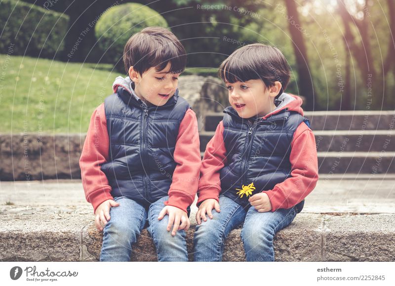 happy brothers sitting in the park Lifestyle Joy Human being Masculine Child Baby Toddler Boy (child) Brothers and sisters Family & Relations Friendship Infancy