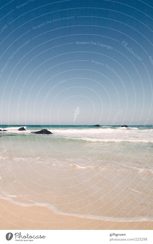 waves of indifference Environment Nature Landscape Elements Sand Water Sky Cloudless sky Horizon Summer Weather Beautiful weather Waves Coast Beach Ocean Blue