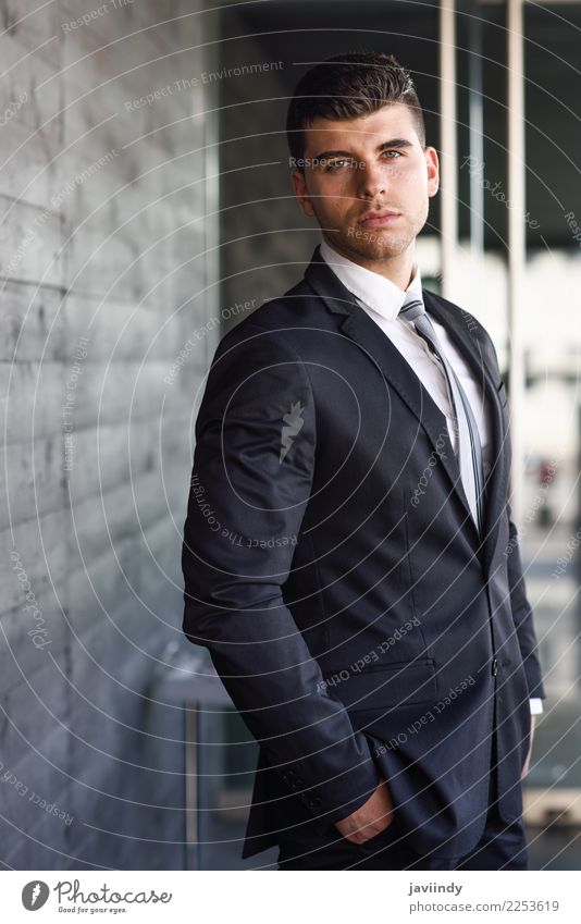 young man with modern hairstyle - a Royalty Free Stock Photo from Photocase