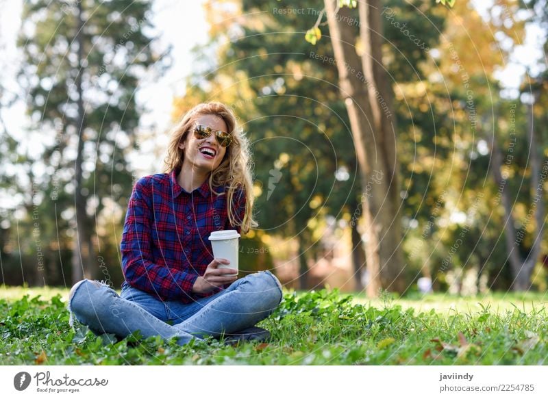 Blonde girl drinking coffee in park sitting on grass Coffee Tea Lifestyle Joy Happy Beautiful Hair and hairstyles Relaxation Human being Feminine Young woman