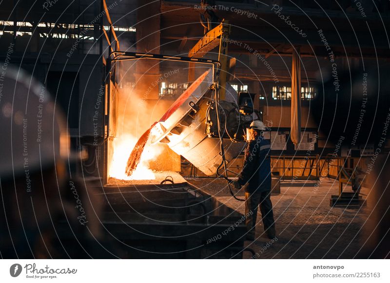 production of aluminium Factory Industry Human being Man Adults 1 Brown Yellow Gold Orange Red Steel Metal Production plant Entertainment industry Colour photo