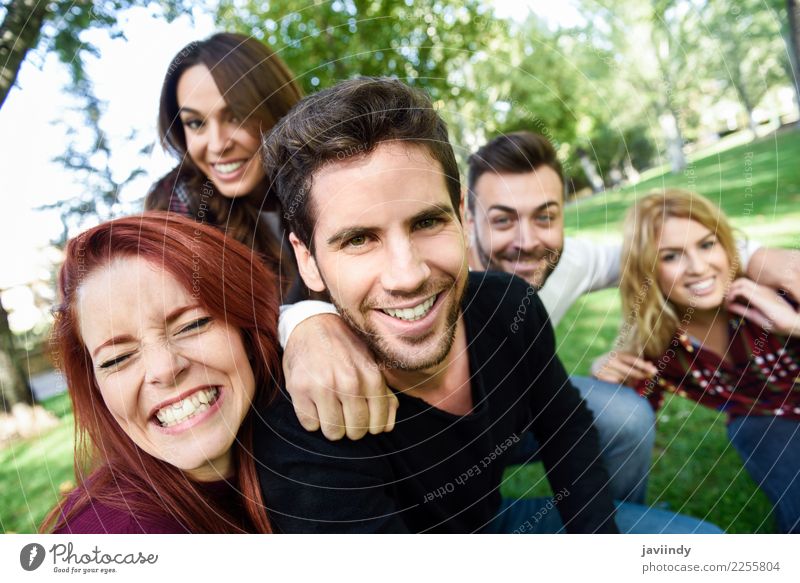 Group of friends taking selfie in urban background. Lifestyle Joy Happy Beautiful Leisure and hobbies Telephone PDA Camera Woman Adults Man Friendship Park