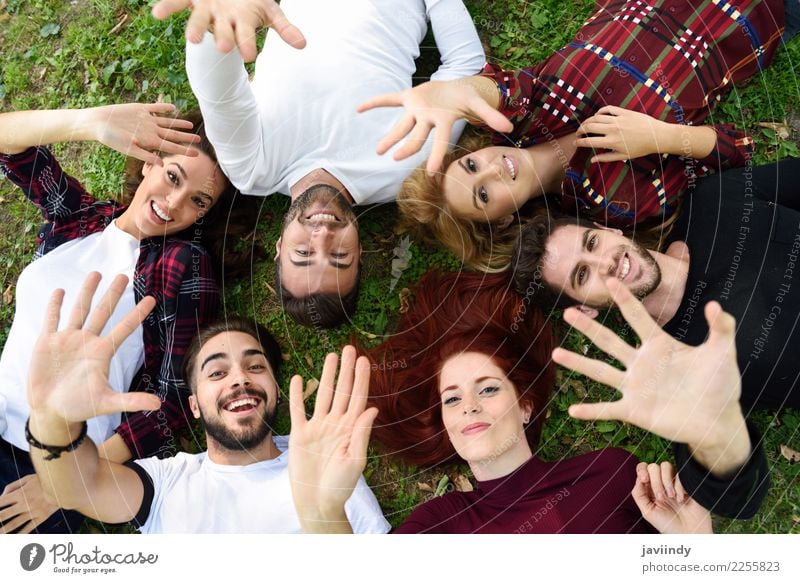 Group of young people together outdoors in urban park. Lifestyle Joy Happy Beautiful Human being Masculine Feminine Young woman Youth (Young adults) Young man