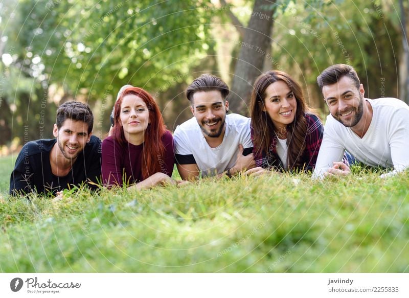 Group of young people together outdoors in urban park Lifestyle Joy Happy Beautiful Human being Masculine Feminine Young woman Youth (Young adults) Young man