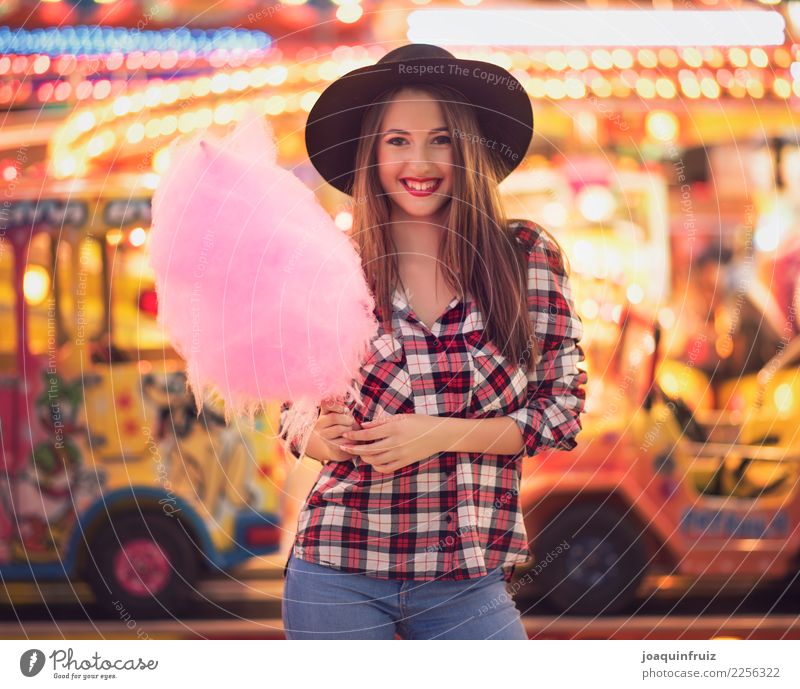beauty girl with a cotton candy in a fair Lifestyle Joy Happy Beautiful Entertainment Woman Adults Park Hat Happiness White Carousel Amusement Park carnival