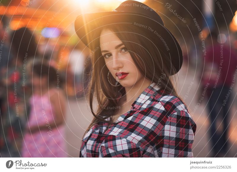 beauty girl with a hat in a fair with many lights Lifestyle Joy Happy Beautiful Entertainment Woman Adults Park Hat Happiness White Carousel Amusement Park