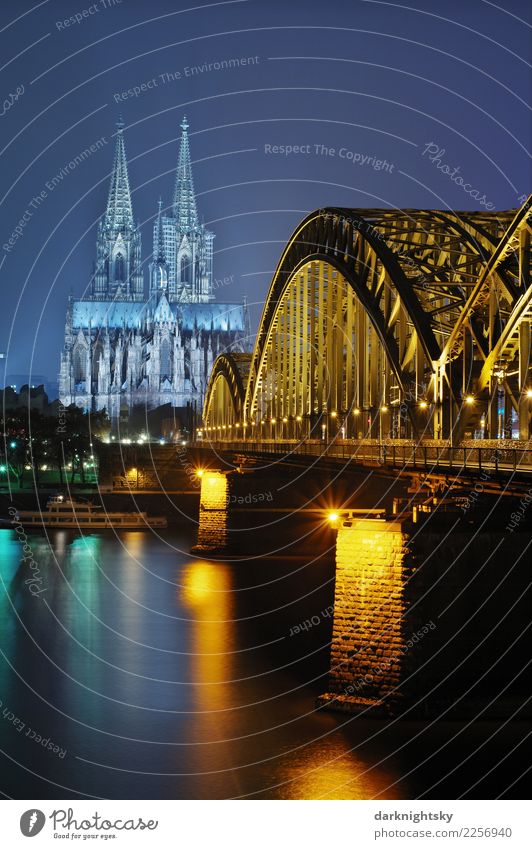 Cologne Night Vertical Water Summer River Rhine Cologne Cathedral Hohenzollern Bridge Federal eagle Europe Town Downtown Old town Dome Manmade structures