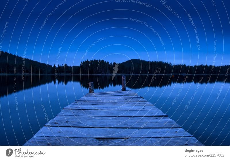 Pier on a lake in the night Vacation & Travel Summer Sun Mountain Nature Landscape Sky Horizon Tree Forest Lake Wood Old Blue Peace Idyll Jetty water tranquil