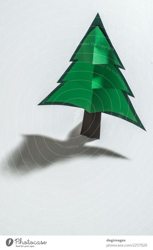 Christmas pine tree made of paper on paper background. Design Winter Decoration Feasts & Celebrations Christmas & Advent Art Tree Paper Ornament New Green White