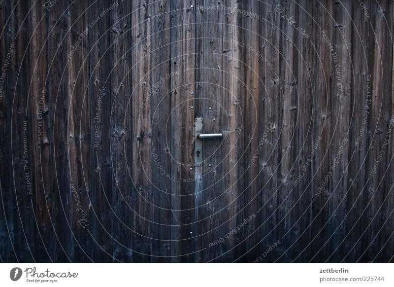gate Door Old Door handle Wood Wooden gate Garage Entrance Way out Scales Colour photo Exterior shot Deserted Copy Space left Copy Space right Copy Space top