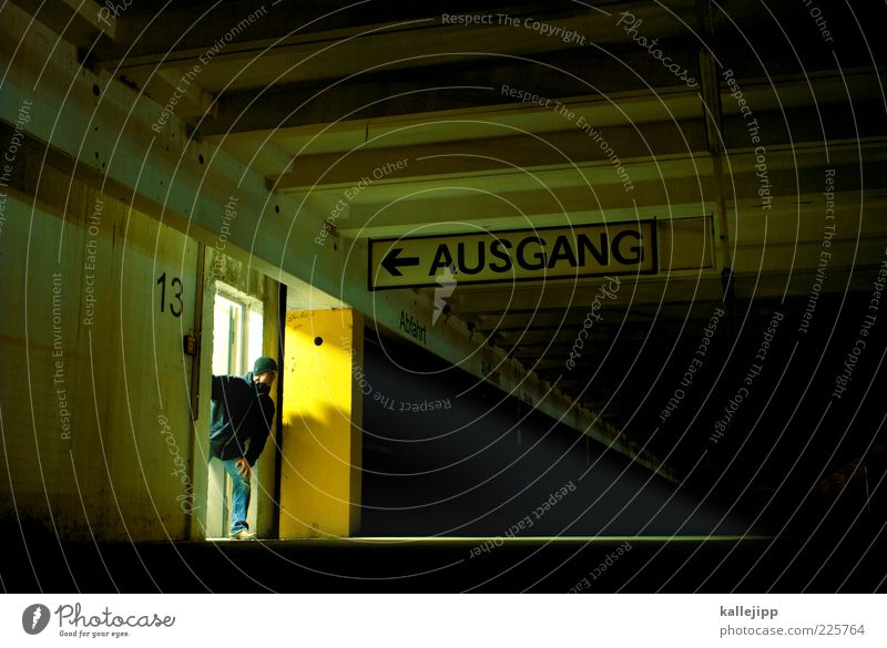comeback attempt Human being Man Adults 1 Parking garage Sign Characters Signs and labeling Signage Warning sign Arrow Looking Way out Entrance