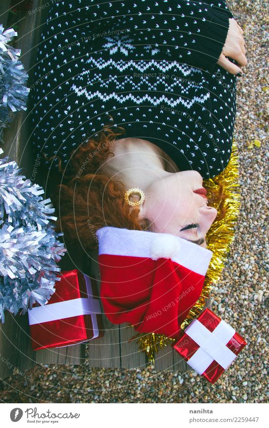 Young woman sleeping rounded by christmas decorations Lifestyle Style Design Beautiful Hair and hairstyles Face Feasts & Celebrations Christmas & Advent
