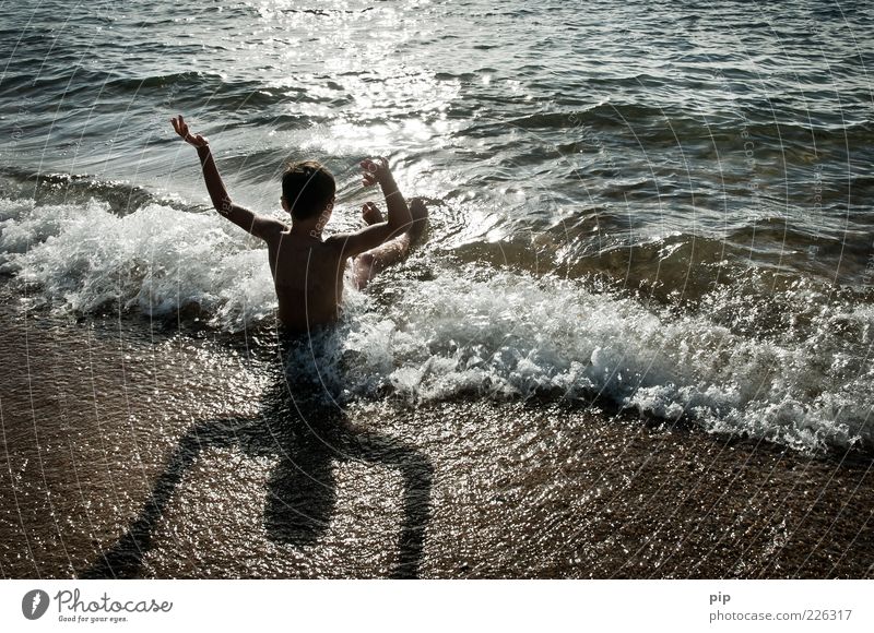 well-wet Human being Boy (child) Infancy Arm 1 Nature Sand Water Summer Beautiful weather Waves Coast Beach Ocean Swimming & Bathing Wait Happiness Wet Joy