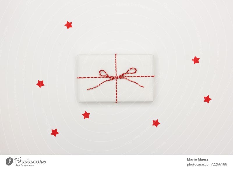 Small white gift with red bow and red stars Christmas & Advent Feasts & Celebrations Esthetic Simple Fantastic Curiosity White Joy Anticipation Design