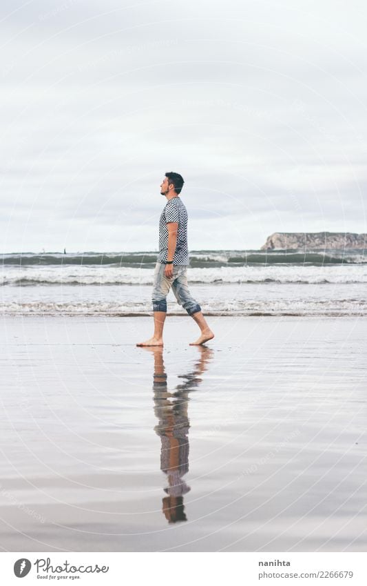 Man walking along the beach Lifestyle Healthy Wellness Harmonious Well-being Relaxation Vacation & Travel Tourism Trip Adventure Freedom Beach Human being