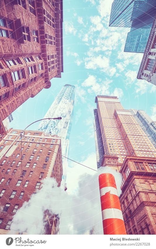 Looking up in New York City, color toned picture, USA. Sightseeing Flat (apartment) Office Town Downtown Skyline Populated House (Residential Structure)