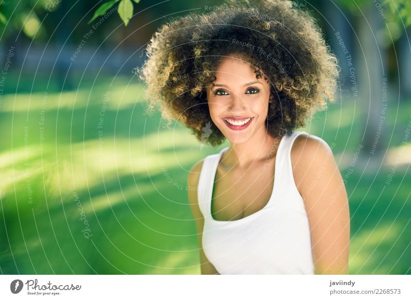 Black woman with afro hairstyle smiling in urban park. Beautiful Hair and hairstyles Face Summer Human being Young woman Youth (Young adults) Woman Adults 1