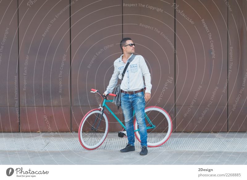 Stylish urban businessman standing on the street with bicycle Lifestyle Elegant Relaxation Sports Business Man Adults Youth (Young adults) Youth culture Street