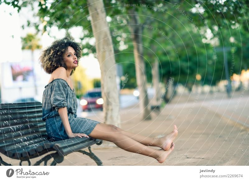 Barefoot black woman with afro hairstyle sitting on a bench Lifestyle Style Beautiful Hair and hairstyles Human being Feminine Young woman Youth (Young adults)