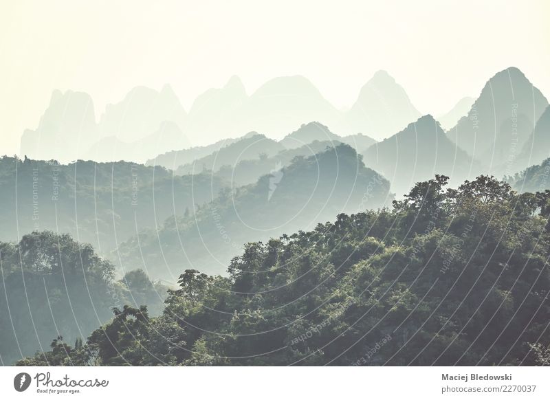 Karst mountains on a foggy day, Guilin, China. Vacation & Travel Adventure Expedition Camping Mountain Nature Landscape Fog Forest Hill Beautiful Green Freedom