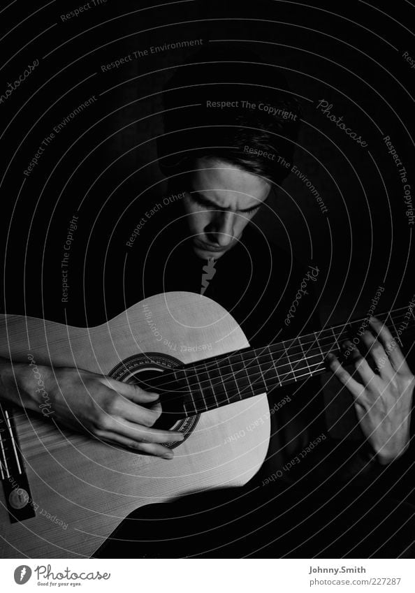 Me and my guitar. Leisure and hobbies Play guitar Human being Masculine 1 Artist Music Musician Guitar Playing Simple Passion Concentrate Black & white photo