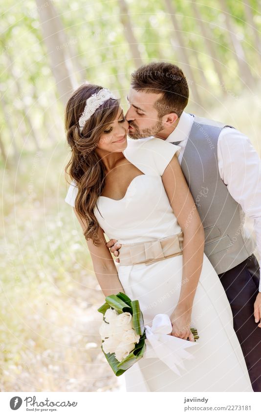 Just married couple together in poplar background Happy Beautiful Feasts & Celebrations Wedding Human being Young woman Youth (Young adults) Young man Woman