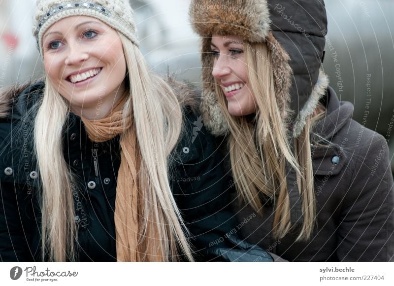 friends VI Human being Feminine Young woman Youth (Young adults) Friendship Life Hair and hairstyles Face 2 Jacket Coat Pelt Cap Touch Smiling Laughter Blonde