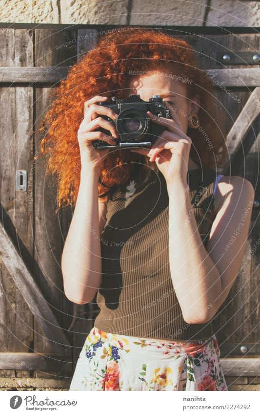 Young redhead woman taking shots with her analog camera Lifestyle Style Leisure and hobbies Photography Photographer Camera Vacation & Travel Tourism Trip