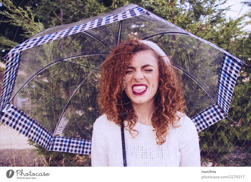 Young redhead woman sticking out her tongue in a rainy day Lifestyle Style Joy Beautiful Hair and hairstyles Wellness Human being Feminine Young woman