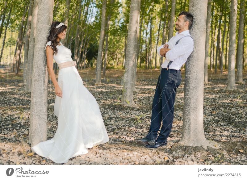 Just married couple together in nature background Happy Beautiful Feasts & Celebrations Wedding Human being Young woman Youth (Young adults) Young man Woman