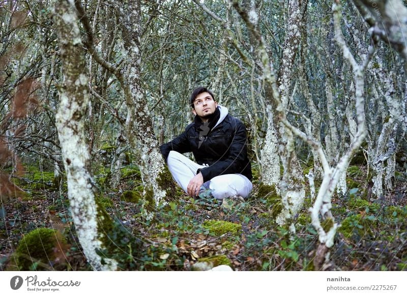 Young man into the forest Lifestyle Vacation & Travel Tourism Adventure Far-off places Freedom Expedition Winter vacation Hiking Human being Masculine