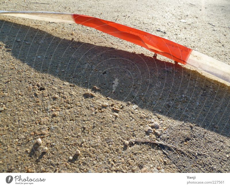 Behind the barrier Earth Red White String Crime scene Colour photo Exterior shot Close-up Detail Day Light Shadow Warning colour Deserted Barrier