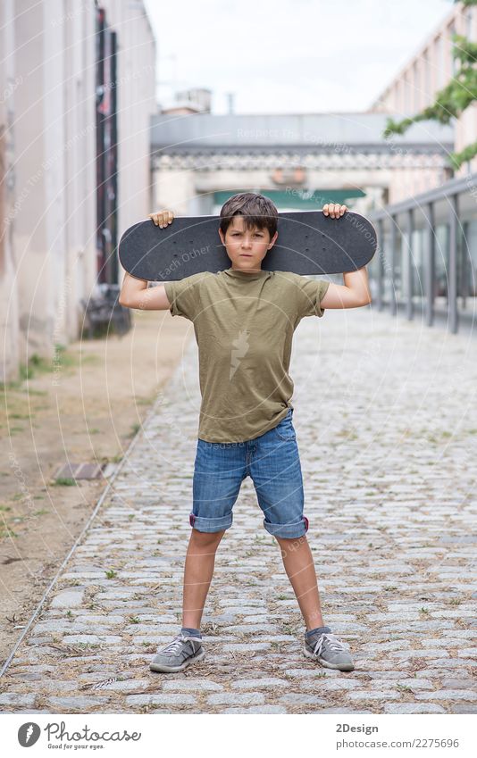 Close-up of a teenage boy carrying skateboard and smiling Lifestyle Leisure and hobbies Vacation & Travel Summer Young man Youth (Young adults) Man Adults