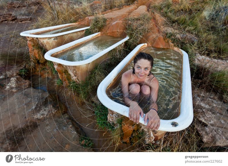 Young woman relaxing in a natural hot springs.. Well-being Relaxation Spa Bathtub Youth (Young adults) 1 Human being 18 - 30 years Adults Swimming & Bathing