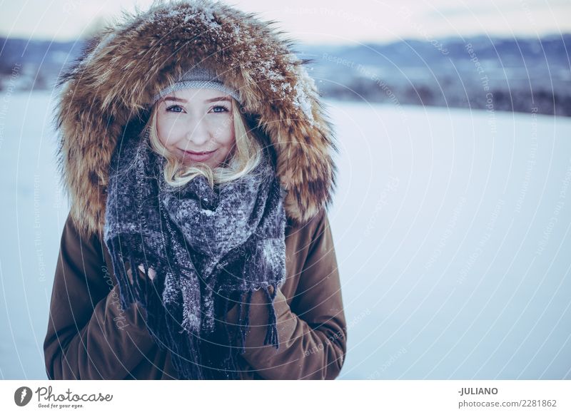 Young smiling girl is hiding her hands from the cold winter Lifestyle Beautiful Winter Snow Winter vacation Human being Feminine 18 - 30 years Woman