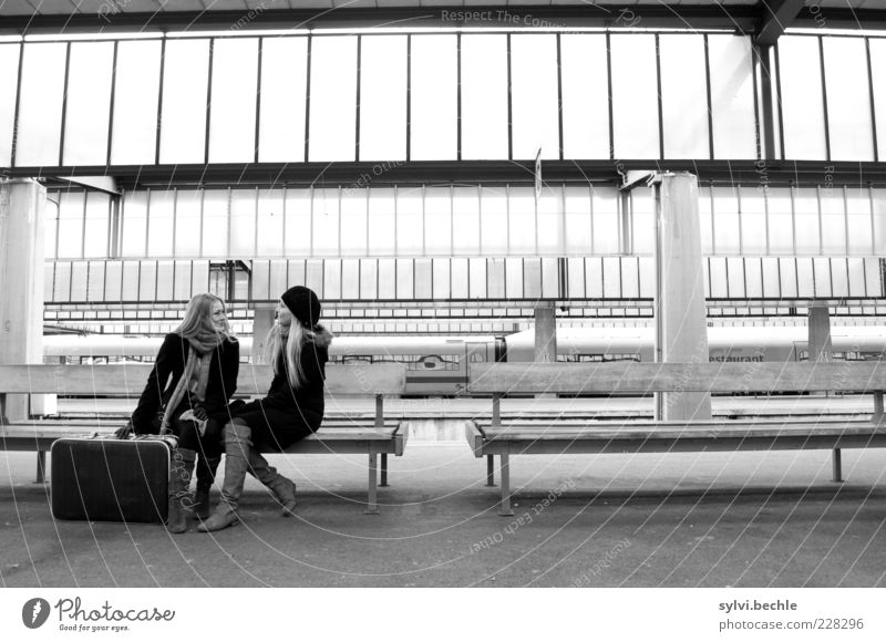 waiting for the train Human being Young woman Youth (Young adults) Friendship Means of transport Passenger traffic Train travel Passenger train Train station