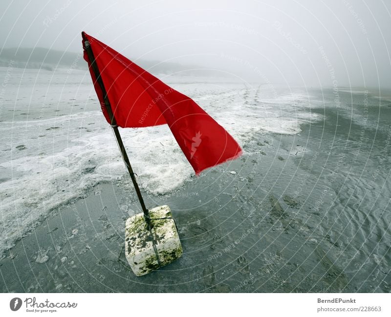 Stranded! Sand Water Winter Bad weather Wind Fog Waves Coast Beach North Sea Baltic Sea Island Flag Sign Loneliness Uniqueness Apocalyptic sentiment Red