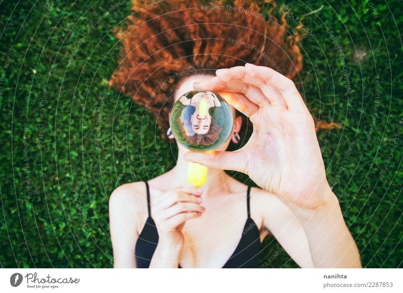 Young woman eating an ice cream viewed through a crystal ball Ice cream Eating Lifestyle Style Design Exotic Joy Beautiful Hair and hairstyles Wellness