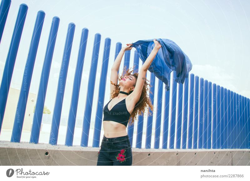 Young woman raising her arms in a windy day Lifestyle Style Design Joy Beautiful Body Wellness Harmonious Freedom Human being Feminine Youth (Young adults) 1